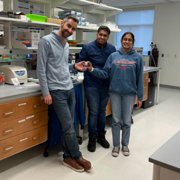 From left to right: Jeff Moran, Amit Kumar Singh, and Tarini Basireddy pose with CoffeeBot samples. Photo by Teresa Donnellan.